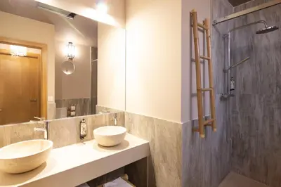 Un baño de Apartamentos Sevilla Este by QHotels