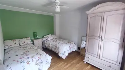 Cama o camas de una habitación en Paredejas del Rey