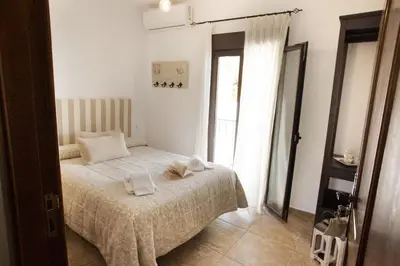 Cama o camas de una habitación en LA POSADA DE LA MUELA