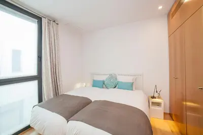 Cama o camas de una habitación en Alohamundi San Marcos