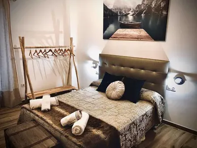 Cama o camas de una habitación en Dúplex el Espejo de la Mezquita