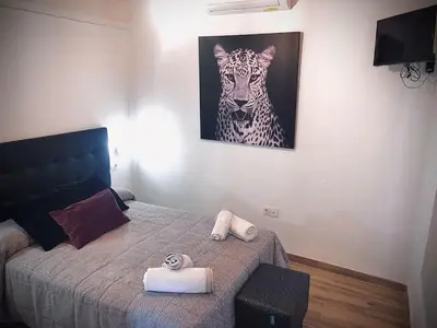 Cama o camas de una habitación en Dúplex el Espejo de la Mezquita