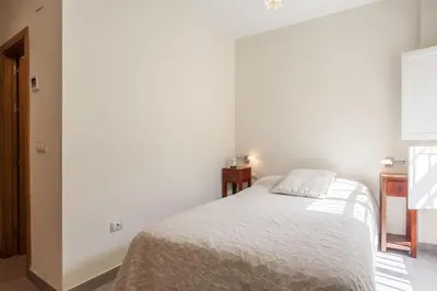 Cama o camas de una habitación en Apartamento con encanto en el Barrio de Santa Cruz