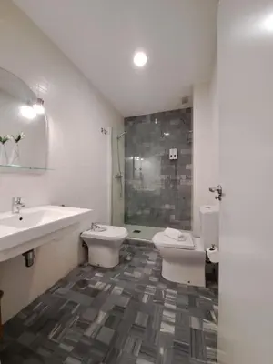 Un baño de DreamsApt Curtidores 6 Suites AT