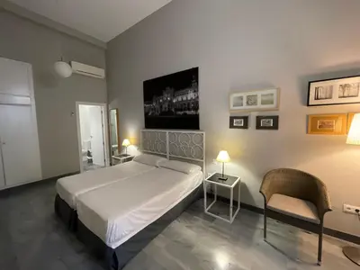 Cama o camas de una habitación en DreamsApt Curtidores 6 Suites AT