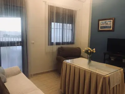 Una televisión o centro de entretenimiento en Like Home