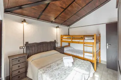 Cama o camas de una habitación en Casa Rural San Miguel