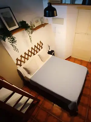 Cama o camas de una habitación en La Puerta Verde de las Setas de Sevilla