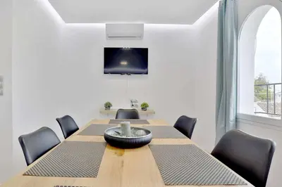 Una televisión o centro de entretenimiento en Apartamento Paseo de La Ribera