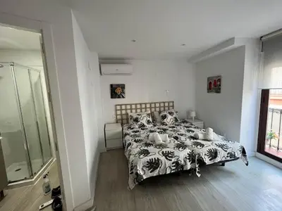 Cama o camas de una habitación en Casa Ribera LUCANO Centro Histórico