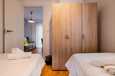 Cama o camas de una habitación en Apartamento cerca del centro y de la estación Santa Justa a pie, 1 plaza de Parking gratis