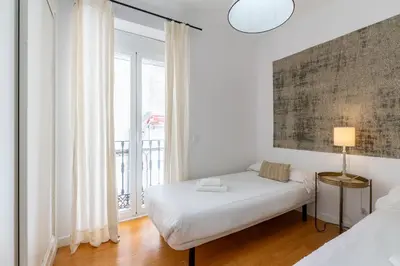 Cama o camas de una habitación en Veoapartment Alhóndiga Primero