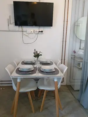 Una televisión o centro de entretenimiento en Corredera Travel 3