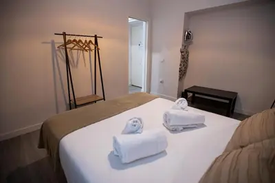 Cama o camas de una habitación en Apartamentos Doña Concha