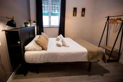 Cama o camas de una habitación en Apartamentos Doña Concha