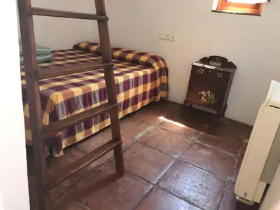 Cama o camas de una habitación en Cortijo Nuevo Alojamiento Rural
