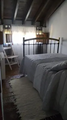 Cama o camas de una habitación en Cortijo Molino los Justos