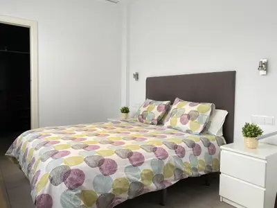 Cama o camas de una habitación en Hispalis Gran Plaza