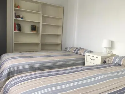 Cama o camas de una habitación en Hispalis Gran Plaza