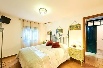 Cama o camas de una habitación en Vivienda Turística La Huerta