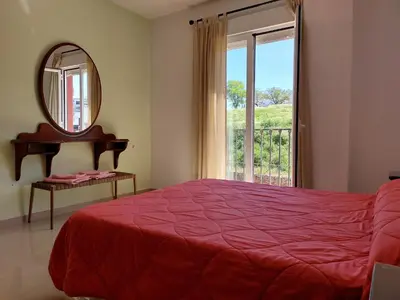 Cama o camas de una habitación en Vivienda Turística Ronda del Carmen