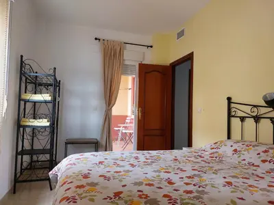 Cama o camas de una habitación en Vivienda Turística Ronda del Carmen