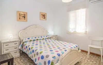 Cama o camas de una habitación en Lovely Apartment In Córdoba With Wifi