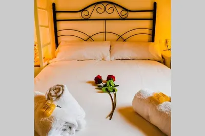Cama o camas de una habitación en Ático céntrico plaza Moravia ,San Julian.