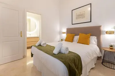 Cama o camas de una habitación en MuMu Luxury Suite Lirio