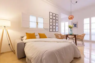 Cama o camas de una habitación en MuMu Luxury Suite Lirio