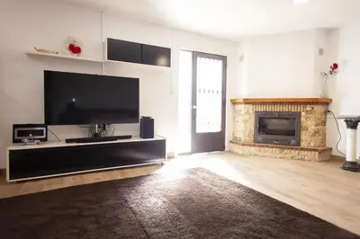 Una televisión o centro de entretenimiento en Charming Villa in Linares with Private Pool