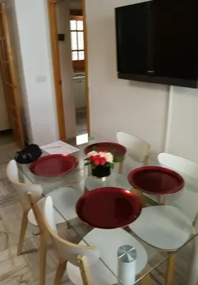 Una televisión o centro de entretenimiento en Córdoba centro esencia cordobesa. Mezquita