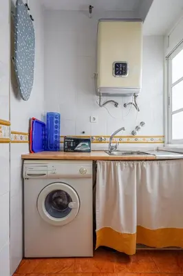 Una cocina o zona de cocina en Descanso-elegancia en Sevilla Parking Gratuito