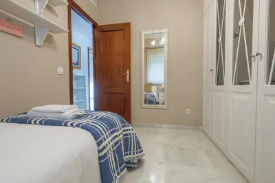 Cama o camas de una habitación en Descanso-elegancia en Sevilla Parking Gratuito