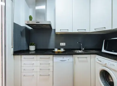 Una cocina o zona de cocina en Feijóo Suite Apartment