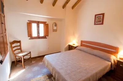 Cama o camas de una habitación en El Cortijo at Molino la Ratonera