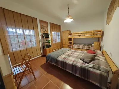 Cama o camas de una habitación en Alojamiento Rural El Paraíso del Chorro