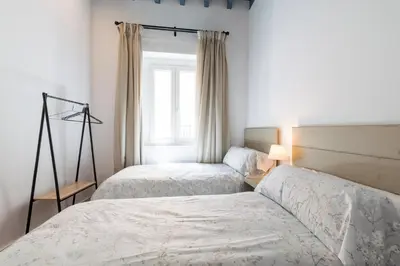 Cama o camas de una habitación en Apartamentos Leoncillos