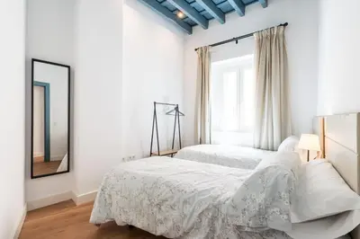 Cama o camas de una habitación en Apartamentos Leoncillos