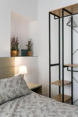Cama o camas de una habitación en Apartamentos Leoncillos