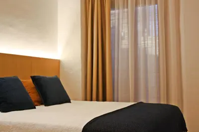 Cama o camas de una habitación en LA ALMACERÍA DE ANTEQUERA