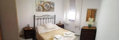 Cama o camas de una habitación en Comfortable Apartment in Central Córdoba, 42 m², Parking.