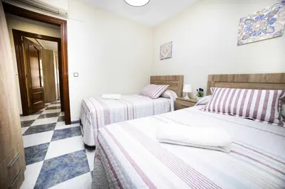 Cama o camas de una habitación en MESONES - PARKING GRATIS - CLIMATIZADO