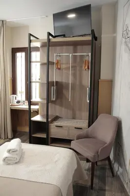 Cama o camas de una habitación en Hospedium DLJ Hostal Temático Desde La Judería