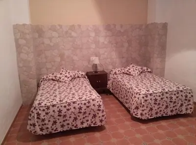 Cama o camas de una habitación en Cortijo el llano Priego de Córdoba