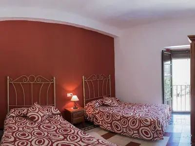 Cama o camas de una habitación en Cortijo el llano Priego de Córdoba