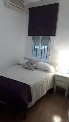 Cama o camas de una habitación en Hostal VILLA CARBULA