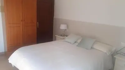 Cama o camas de una habitación en Hostal VILLA CARBULA
