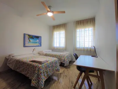 Cama o camas de una habitación en La casa del olivo en Córdoba