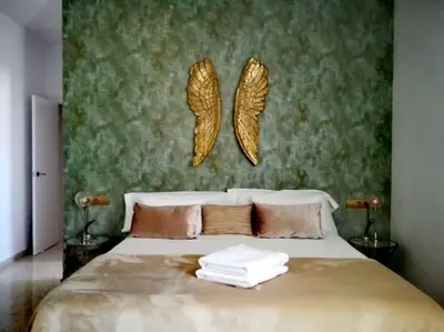 Cama o camas de una habitación en El Patio de San Bernardo